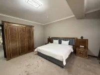 Reikartz Qarshi Hoteles cerca de Kurant
