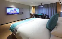 โรงแรมอินน์เดลิคาซี่ แอนด์ วอร์ม·การ์เดนเนีย บลอสซัม - ที่มีที่จอดรถ