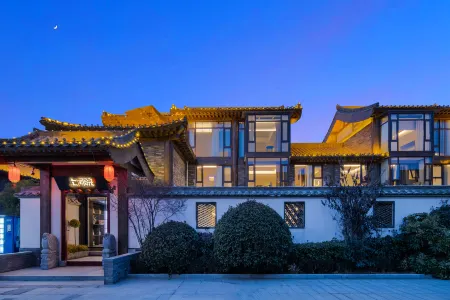 Shangheyuan Homestay (Kaifeng Millennium City Park) Отели рядом с достопримечательностью «Henan Kaifeng Science & Technology Media College»