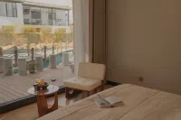 Lijiang Yu Xue Yi Jing Snow Mountain View Resort Hotel