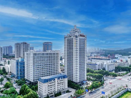 Aisheng Hotel (Yantai University municipal government store) Отели рядом с достопримечательностью «Wenjing College Yantai University»