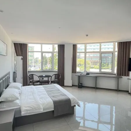 Huayue Jingzhi Hotel (Haidai Bus Station)