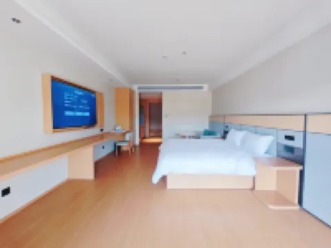 Four Seasons Apartment (Songjiang Maoting Road Branch) Hotel berhampiran Shanghai Chedun Long-distance Passenger Transport Company