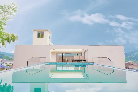 Daweishan Baisha Bai Homestay Отели рядом с достопримечательностью «Daweishan National Forest Park»