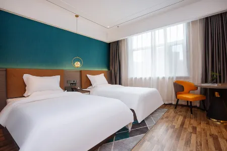 Aifei Hotel (Tonghua Wanda Plaza) Отели в г. Тунхуа