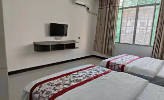 Libo Xiaoqikong Hejiahuan Inn