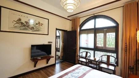 Longfengshan Ancient Town Zixiangyuan Homestay Отели в г. Ичуань