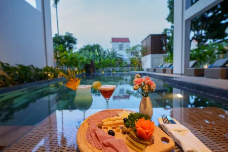 Cozy An Boutique Hotel Hoian Отели рядом с достопримечательностью «Это До Там Кван Пагода»