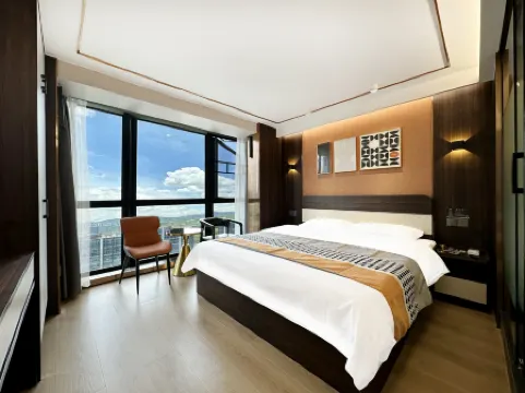 Sina International Apartment (Guangzhou Luogang Agile Plaza Shuixi Metro Station) Отели рядом с достопримечательностью «Qingfeng»