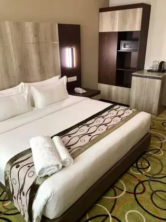 Jinyuan Hostel (Wafangdian Railway Station) Отели в г. Вафандянь