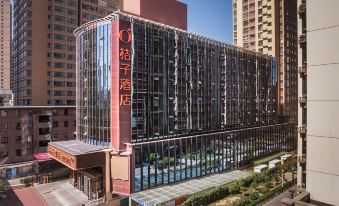 Orange Lanzhou Xiaoxihu Subway Station Hotel