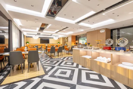 New Beacon International Hotel ( Wuhan International Expo Center Branch) Отели рядом с достопримечательностью «Wuhan International Expo Center»