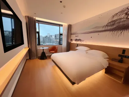 Mi Duo Hotel Отели рядом с достопримечательностью «Zhijiang Tianhou Temple»