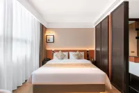 Xingang Holiday Hotel(Xinzheng International Airport Shop) Hotels in Xinzheng