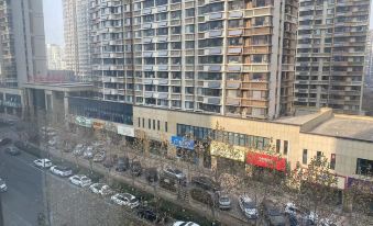 Rizhao S'anbian Intelligence Cinema Apartment