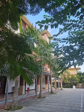 Jinghong Duoli Inn Отели рядом с достопримечательностью «Menghanman Tingfota Temple»