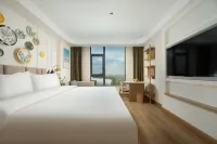 O.live Social Hotel (Zhanjiang Xuwen Huochezhan Mulan Dadao)