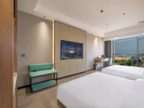 Menghai Boting Hotel (Xishuangbanna Menghai Mengbala International Resort Rainforest Avenue Branch) Hotels in Menghai