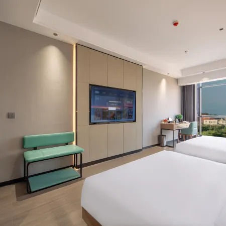 Menghai Boting Hotel (Xishuangbanna Menghai Mengbala International Resort Rainforest Avenue Branch)