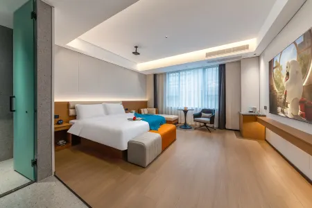 Weimeijia Hotel (Haikou East Railway Station Longfor Paradise Walk Branch) Отели рядом с достопримечательностью «Hainan Medical University (Chengxi Campus)»