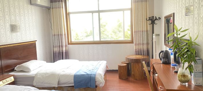 Shiji Jinyuan Business Hotel Отели в г. Моцзян