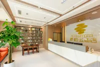 Rujia Pebble Hotel (Linshu Ginza Mall Darihong Plaza)