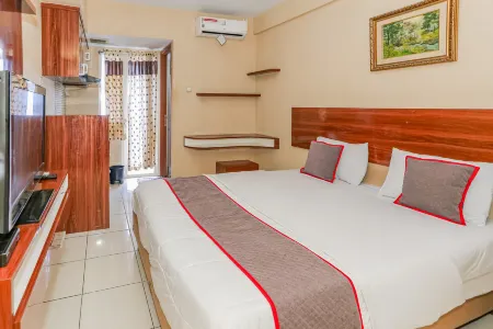 Hotel O Asia Rooms @ Green Lake View Ciputat Отели в г. Cипутат