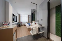 Tusheng Hotel (West Coast City Terrace) Отели рядом с достопримечательностью «Автобусная станция Западного побережья Циндао - автобусная станция Гуаннань»