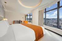 Bairan Private Hot Spring Smart Cinema Design Hotel (Xingyi Jushan Square Huijin Center)