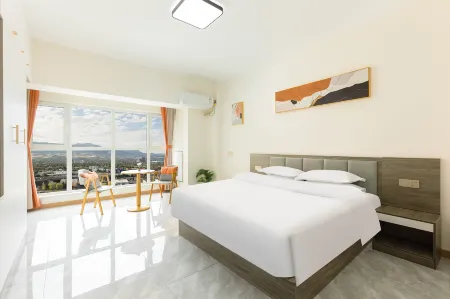 Qiyue Qingya Apartment Hotel (Longkou Boshang Shopping Plaza) Отели рядом со станцией Longkoushi Railway Station