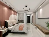 智美·輕居影音民宿（駐馬店高鐵西站凱旋廣場店）