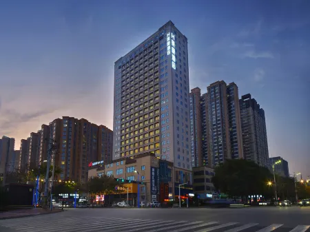 Mehood Hotel (Tongchuan New Area People's Hospital Gymnasium) Отели в г. Тунчуань