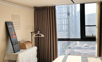 Dacheng Xiaoyuan Homestay (High Speed Rail East Station Zhengdong Commercial Center Branch)