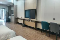Luntai Zitong Hotel (Luntai Passenger Station Xinxin Road Pedestrian Street) - โรงแรมราคาถูก