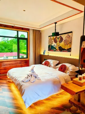 Baimagangzhuangyuan Hotel a Mêdog