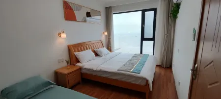 Feiyu Homestay Отели рядом с достопримечательностью «Thumb Plaza»