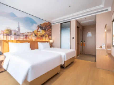 Vienna Hotel (Mengcun Tuanjie Road Party School Branch) Hotels in Mengcun