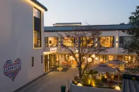 Floral Hotel·Taoxiang Yinsu Homestay (Sanbao International Pottery Village Branch) - Water Park