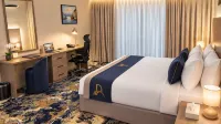Dome Hotel Service Apartment Nuzha - Condos