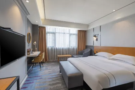 Jingjing Light Luxury Hotel (Mingshi Branch) Отели рядом с достопримечательностью «Chishuiyuan Square»