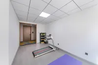 Ming Qianli Hotel - Fitnessstudio