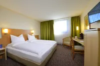 PLAZA INN Leonberg Hotel dekat KDW - Garten & Wärme