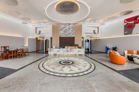 Junyi Hotel (Wuhua Gucheng Hospital) Отели рядом с достопримечательностью «Wuhua Open University»