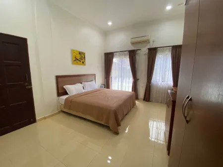 Capital O 91094 Hotel & Chalet Sportfishing Отели рядом с достопримечательностью «Entopia by Penang Butterfly Farm»