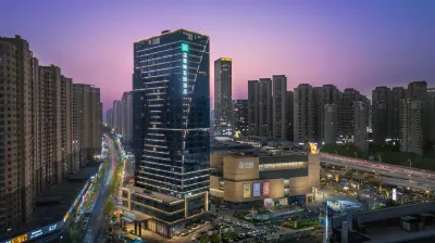 贛州溫德姆花園飯店（萬象城店） 哇哦·親子樂園（雲星世紀廣場店）附近的飯店