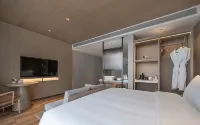 Huiting Yunju Hotel (Xishuangbanna Jinghong Gaozhuang West Shuangjing Xingguang Night Market Branch) - 4-Star