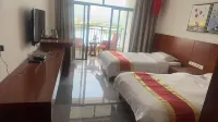 Ledong Jiusuo Shenghua Hotel - servizio colazione