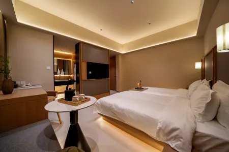 Yichun Xing'anli hotel Отели в г. Ичунь