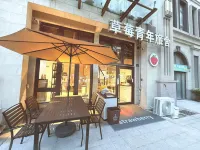 Strawberry Youth Hostel (Train Station, Zhanqiao Branch) Hotel di 