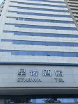 Xingnuo Hotel (Tianjin Xiao Bai Lou Five Avenue) Hotels near ملعب مينيوان